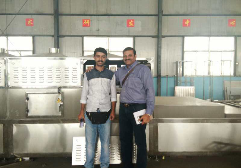 印度客戶商談采購花生成人看片免费烘焙設備事宜